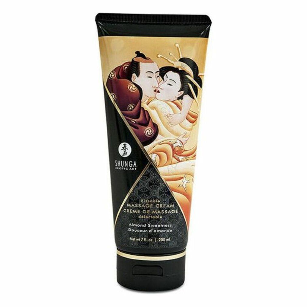 Tubo di crema per massaggio. Tappo nero, corpo dorato con illustrazione. Testo: SHUNGA, Massage Cream, Almond Sweetness.