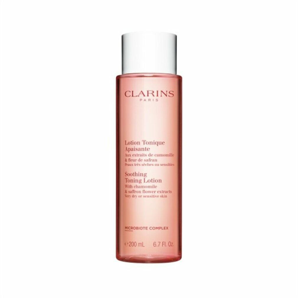 Flacone Clarins Tonico Lenitivo Fortificante. Liquido rosa, tappo bianco. Testo: Lotion Tonique Apaisante, Soothing Toning Lotion.