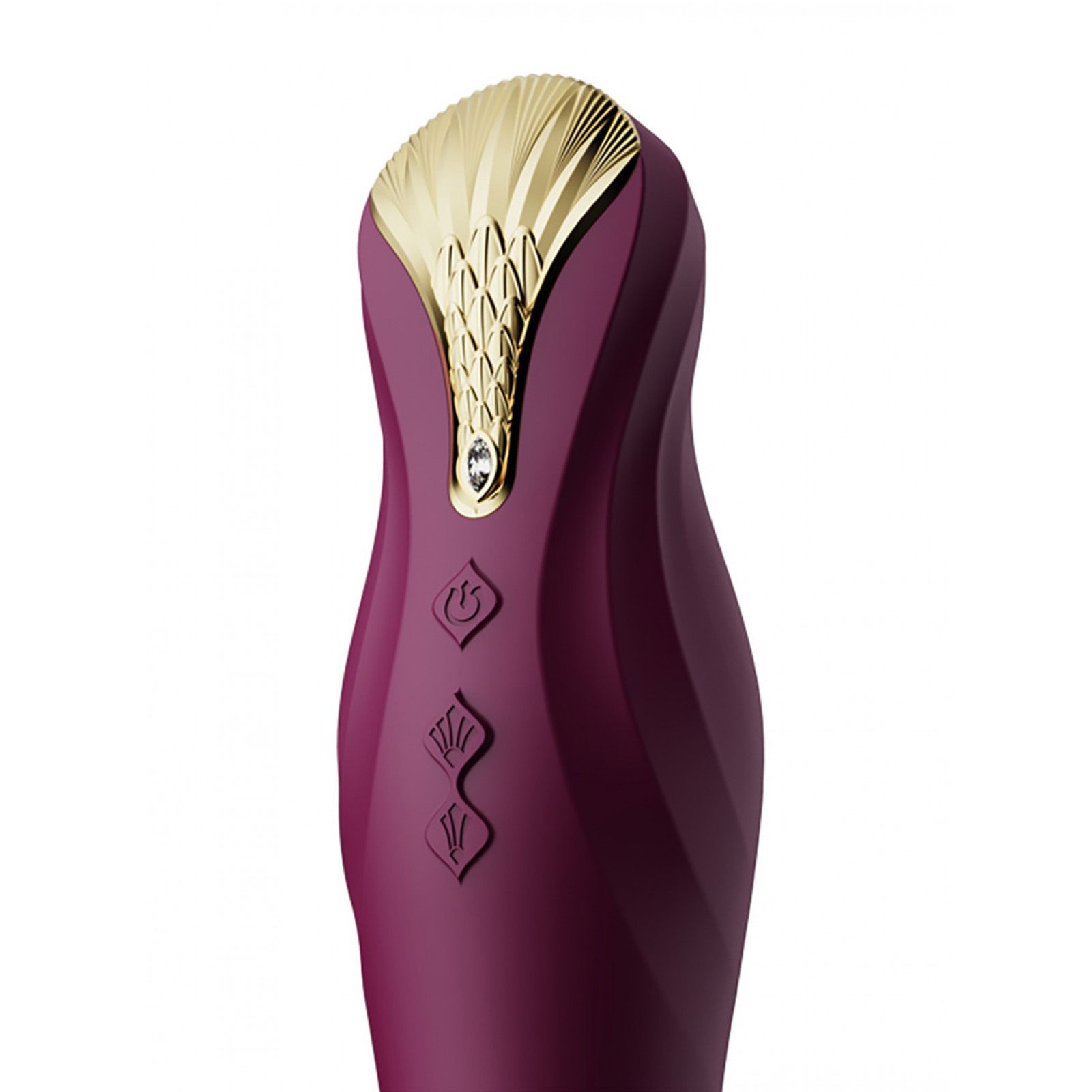 Primo piano della testa del vibratore. Design dorato. Tre pulsanti di controllo.