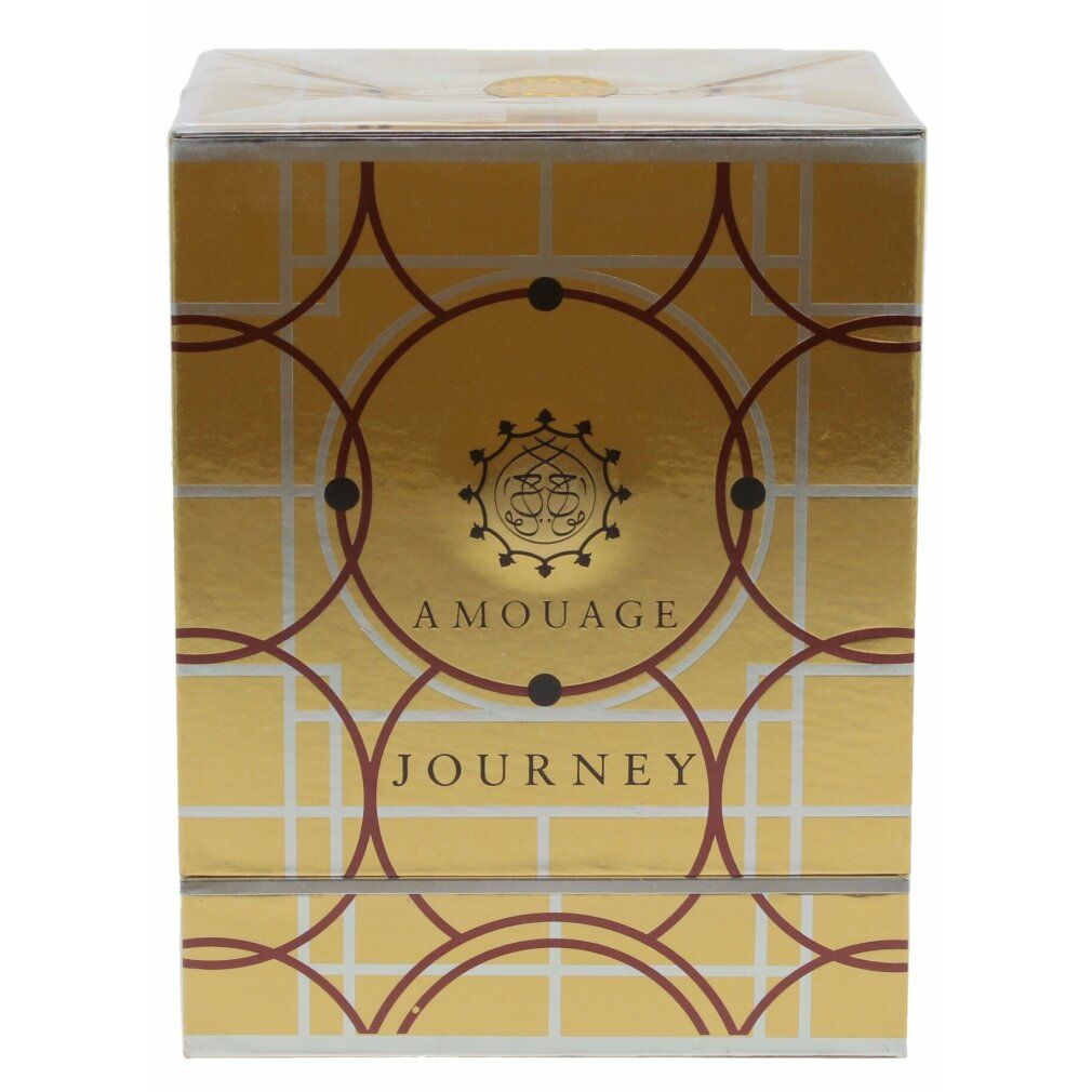 Confezione dorata con scritta: Amouage Journey.