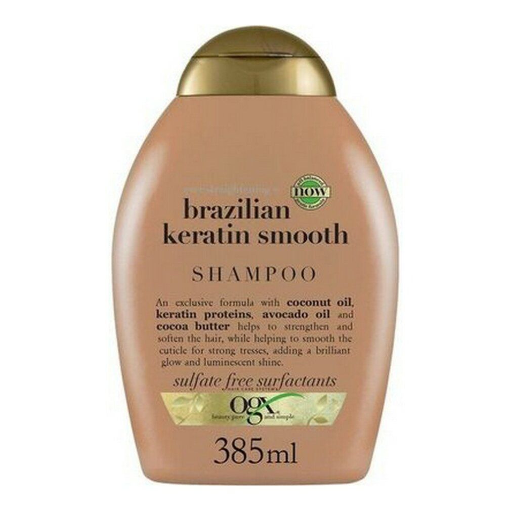Flacone di shampoo beige con tappo dorato. Scritta: Brazilian Keratin Smooth Shampoo. Contiene olio di cocco, proteine della cheratina.