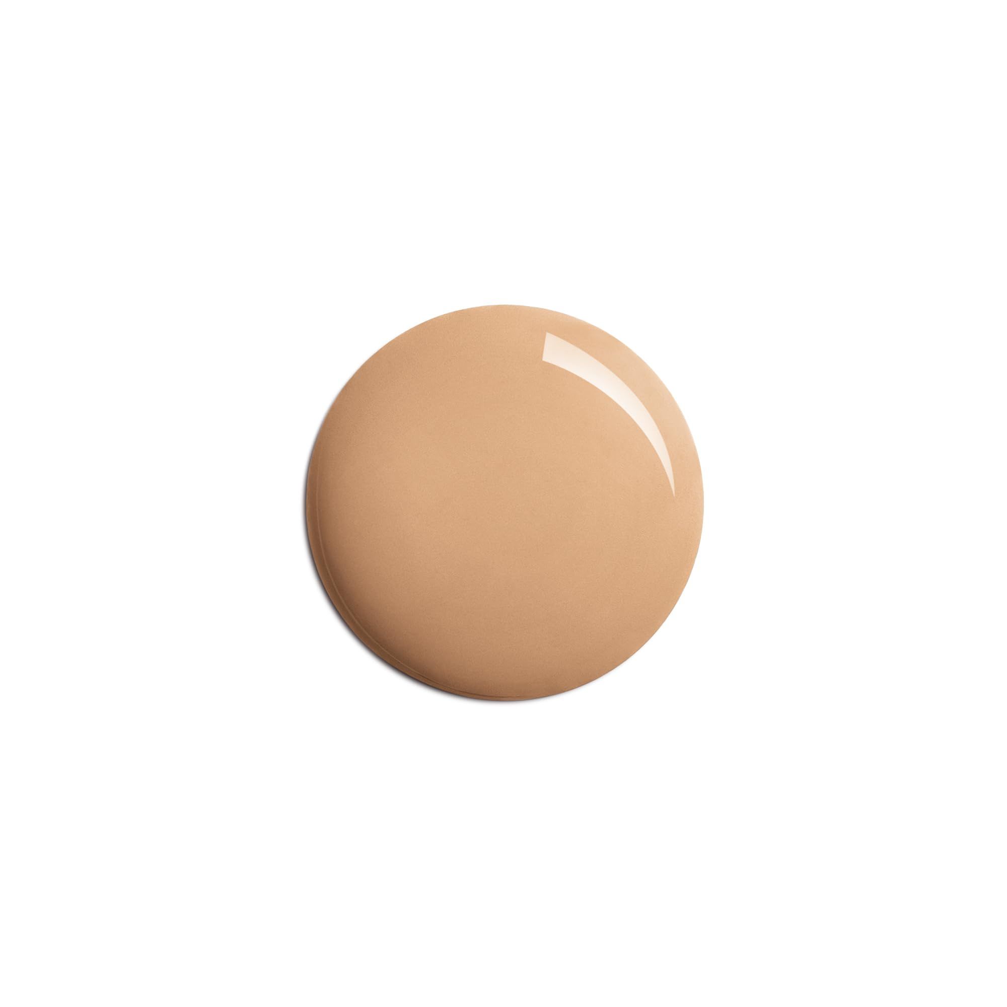 Macchia rotonda di liquido colorato. Colore beige chiaro. Superficie lucida. Su sfondo bianco.