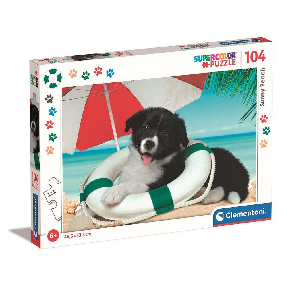 Clementoni Sonnenstrand-Puzzle 104 pezzi. Confezione con motivo puzzle: cane nel salvagente sulla spiaggia.