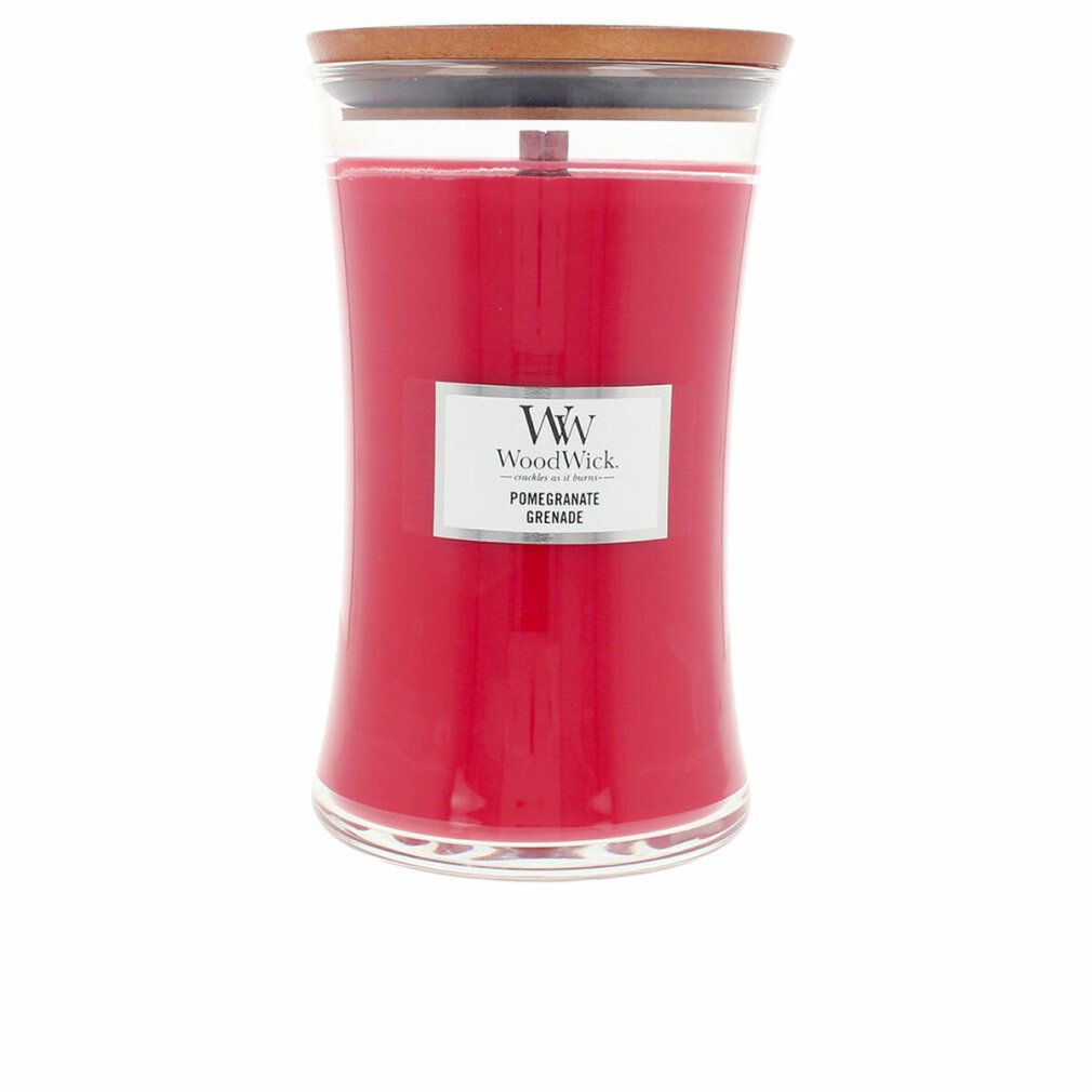 Candela rossa in vetro con coperchio in legno. Etichetta "WoodWick" e "Pomegranate Grenade".