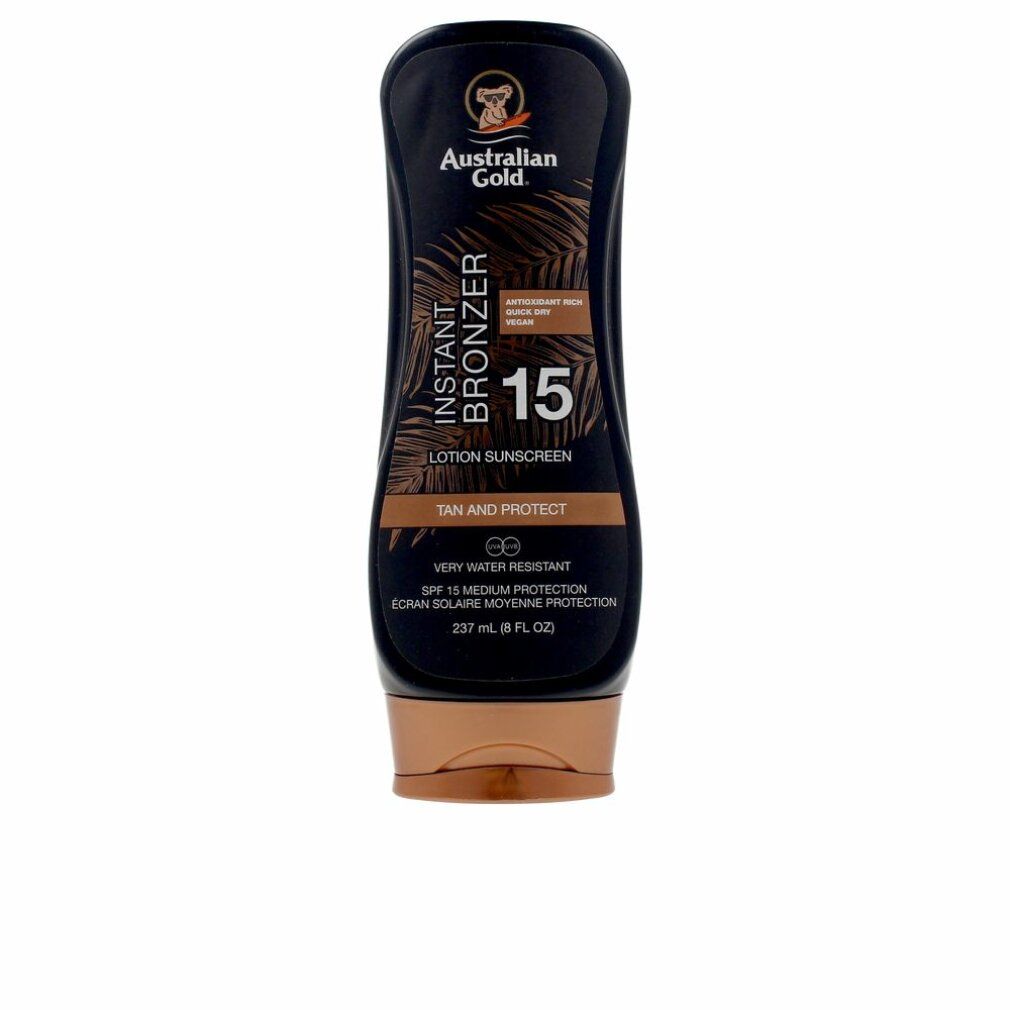 Flacone di lozione abbronzante marrone. Scritta: Instant Bronzer 15, SPF 15. Resistente all'acqua. Marchio: Australian Gold. Tappo nero, base marrone.