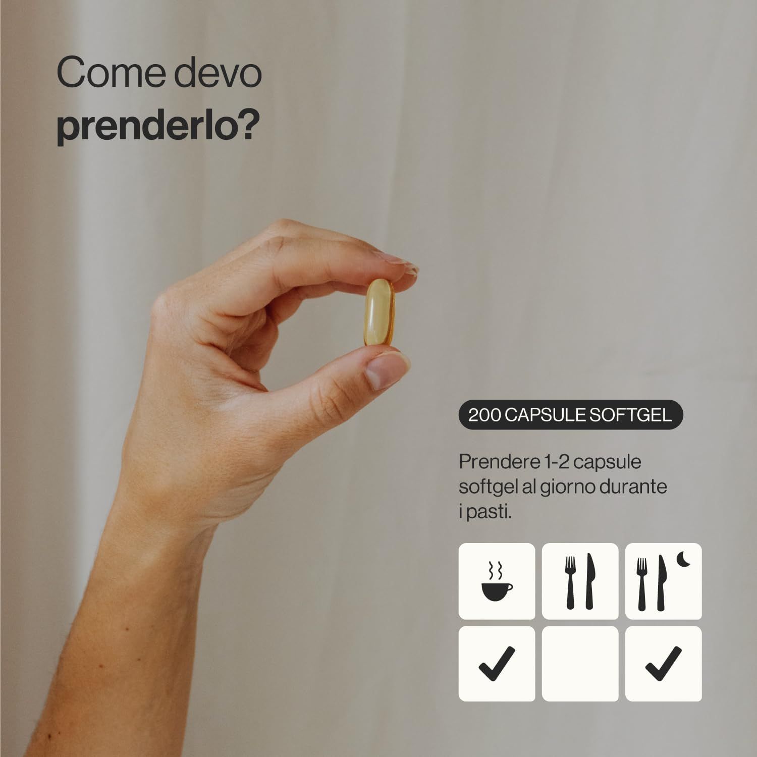 Una mano tiene una capsula. Testo: 200 capsule softgel. Assumere 1-2 capsule softgel al giorno durante i pasti. Simboli: tazza, forchetta, forchetta e luna, spunta, spunta.