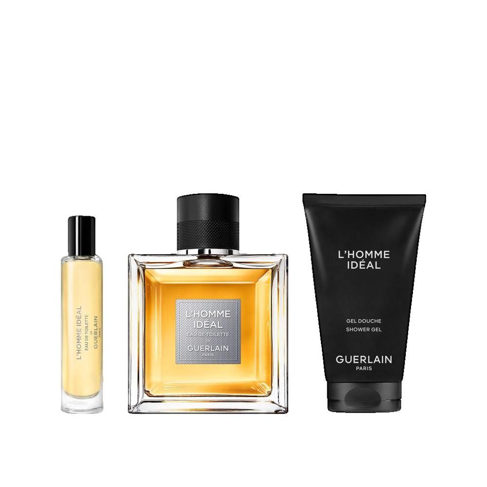 Tre prodotti L'Homme Idéal: flacone di profumo, eau de toilette e gel doccia. Tappi neri e confezione.