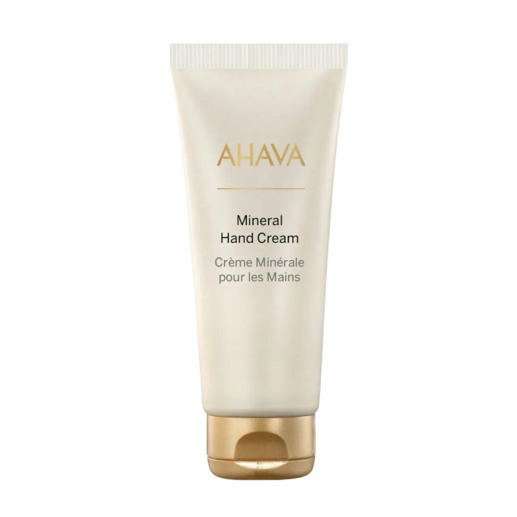 Tubo di crema con logo AHAVA. Scritta: Mineral Hand Cream, Crème Minérale pour les Mains.