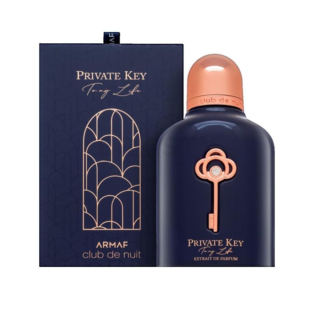 Flacone di profumo blu scuro con tappo color rame e design a chiave. Scatola rettangolare con logo.