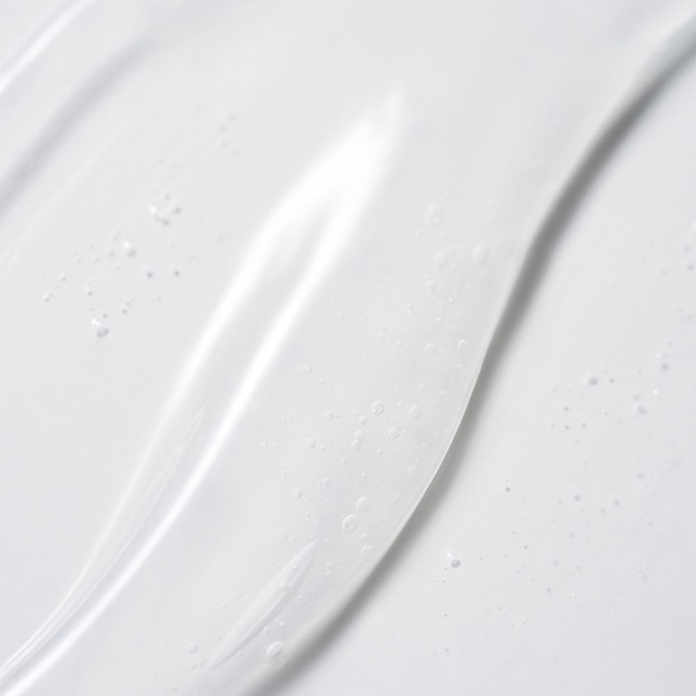 Primo piano di gel trasparente. Texture con piccole bolle.