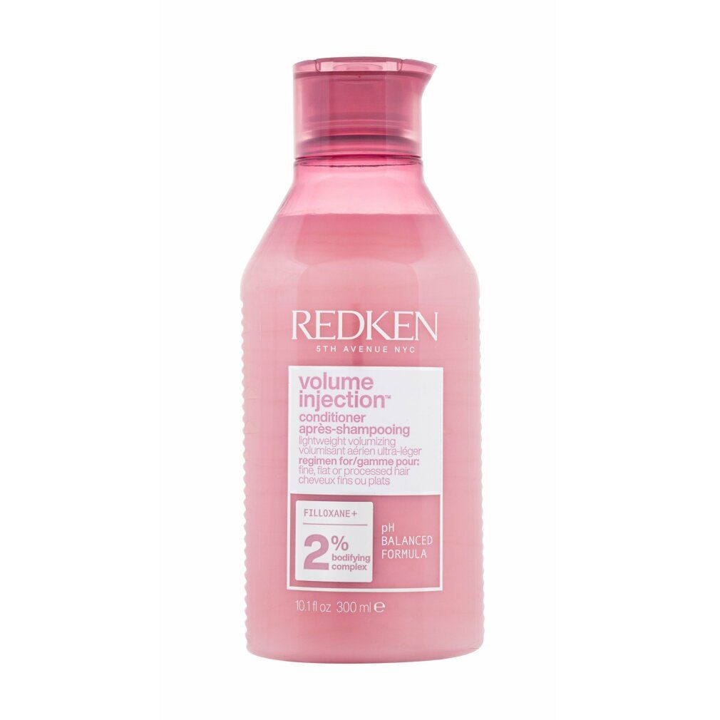 Flacone rosa con tappo rosso. Scritta: Redken Volume Injection Conditioner. 2% Filloxane.