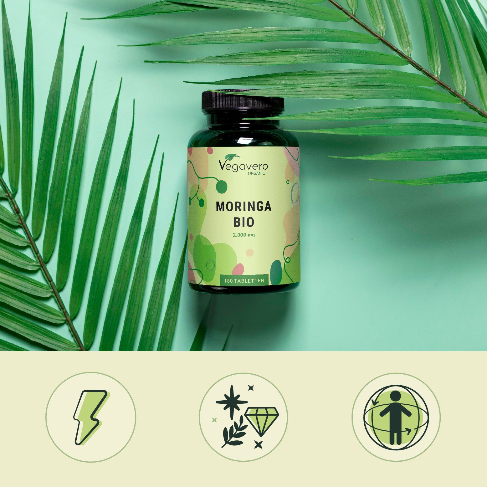 Flacone verde con tappo nero. Scritta: Moringa BIO, 180 compresse. Logo Vegavaro. Su sfondo verde con foglie.