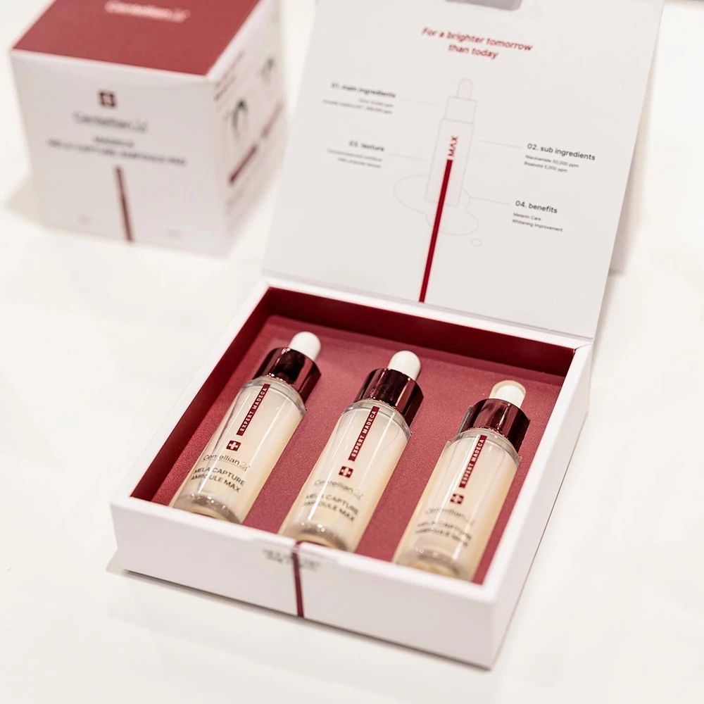 Confezione: scatola con tre flaconi CENTELLIAN24 Mela Capture Ampoule Max. Bianco, tappo rosa.