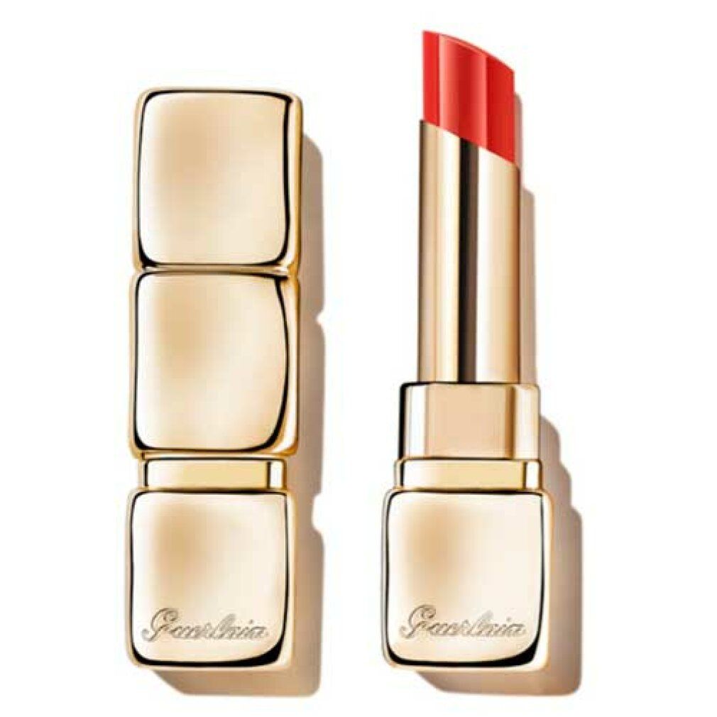 Rossetto dorato, aperto e chiuso. Mina rossa visibile. Logo Guerlain.
