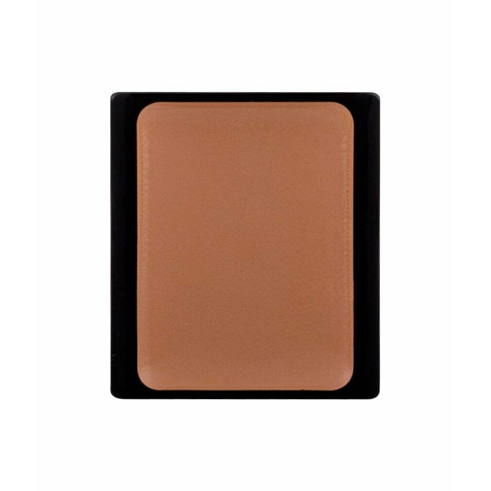 Crema camouflage compatta e rettangolare. Colore beige-marrone in un contenitore nero.