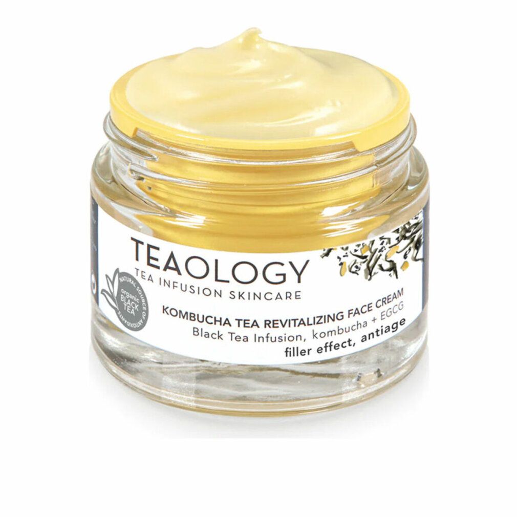 Vasetto di vetro con crema giallastra. Scritta: Teaology, Kombucha Tea Revitalizing Face Cream. Tè nero, kombucha + EGCG.