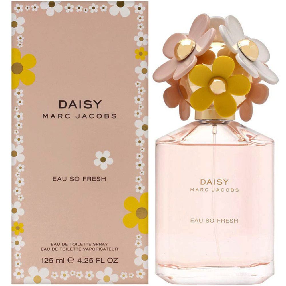 Flacone rosa con tappo a fiori e scatola. Scritta: DAISY MARC JACOBS, Eau So Fresh. Scatola con motivi floreali.