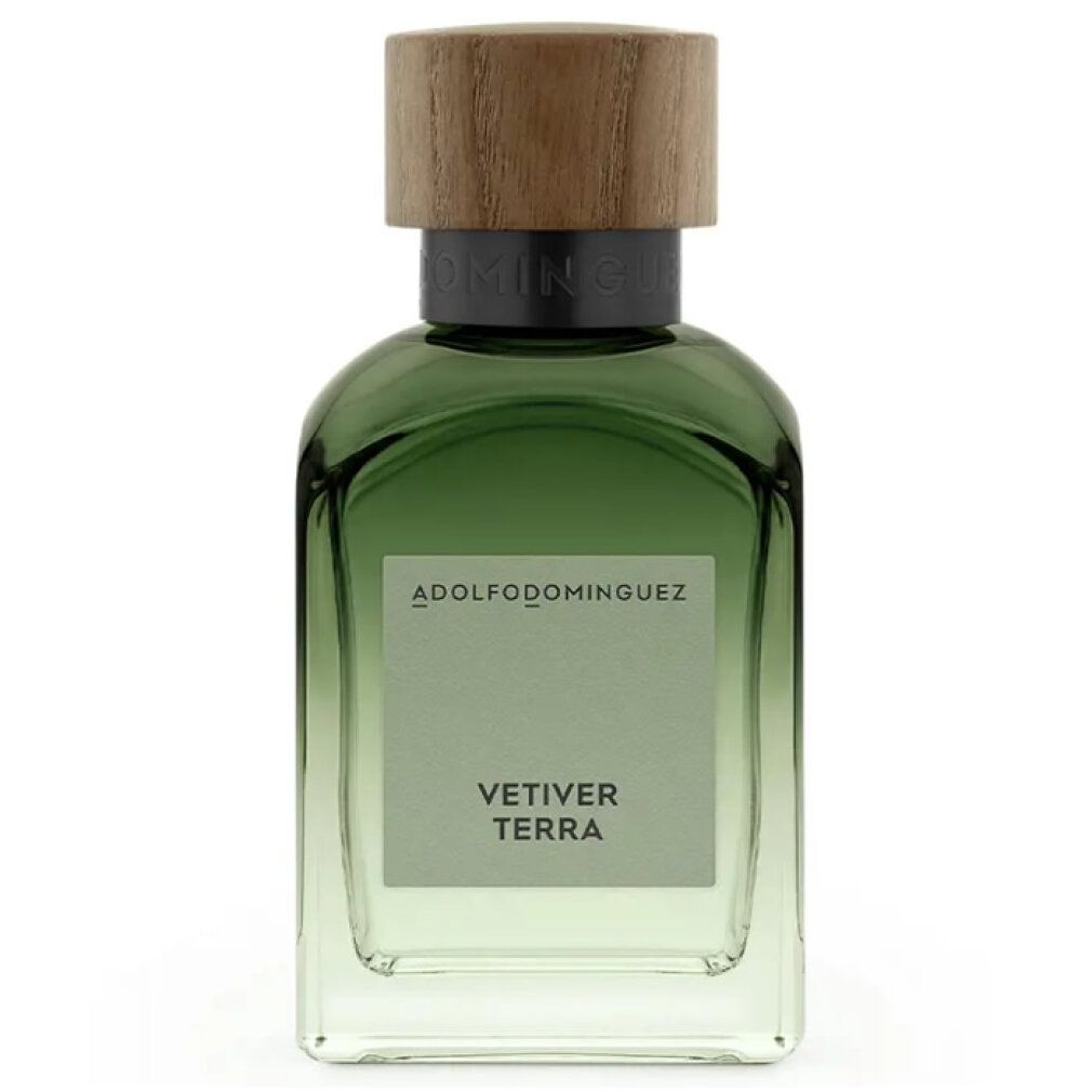 Flacone di vetro verde con tappo in legno. Scritta: VETIVER TERRA. Marchio: ADOLFODOMINGUEZ.