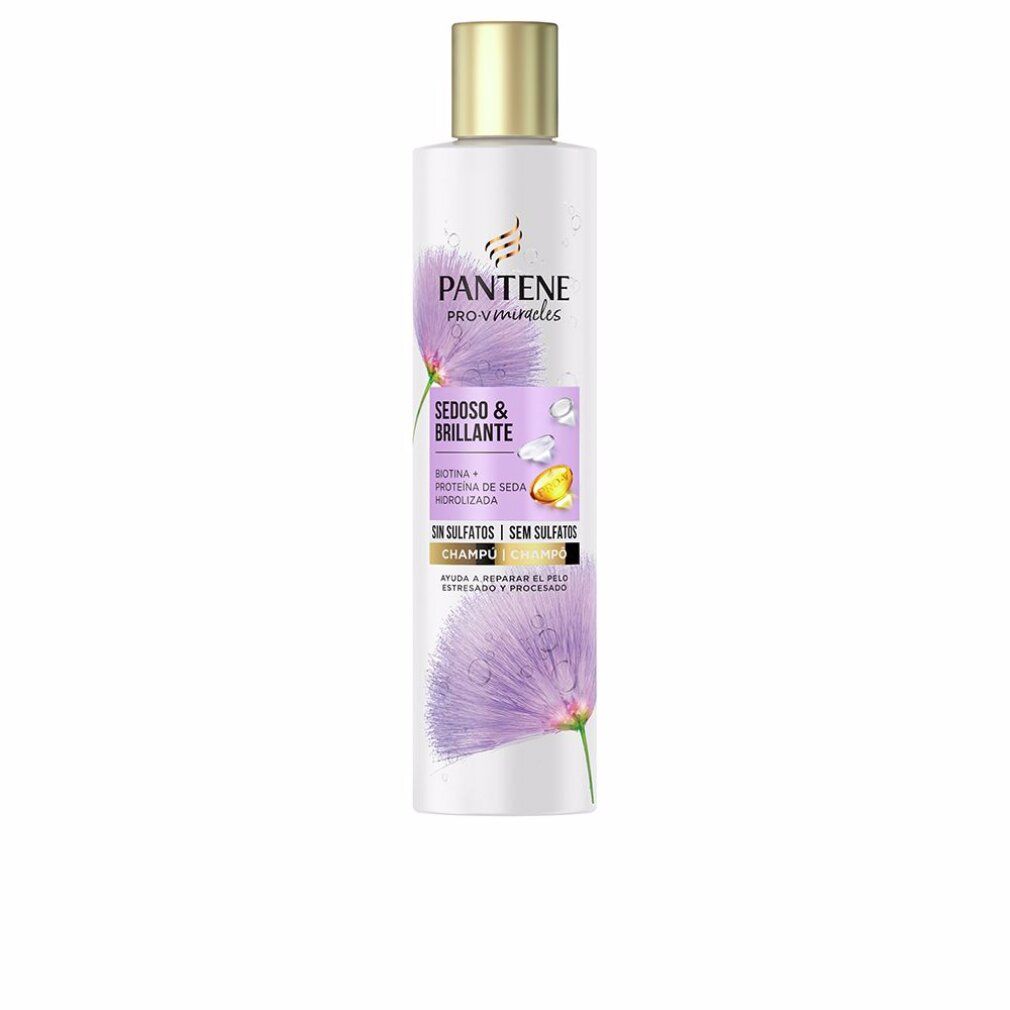 Shampoo bianco con tappo dorato. Scritta: Pantene Pro-V Miracles, Sedoso & Brillante, Champú.