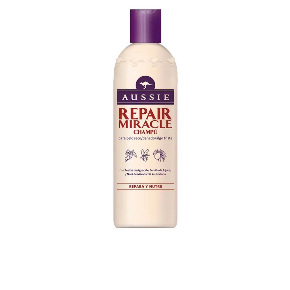 Flacone di shampoo beige con tappo viola. Scritta: Aussie Repair Miracle Champú. Logo canguro.