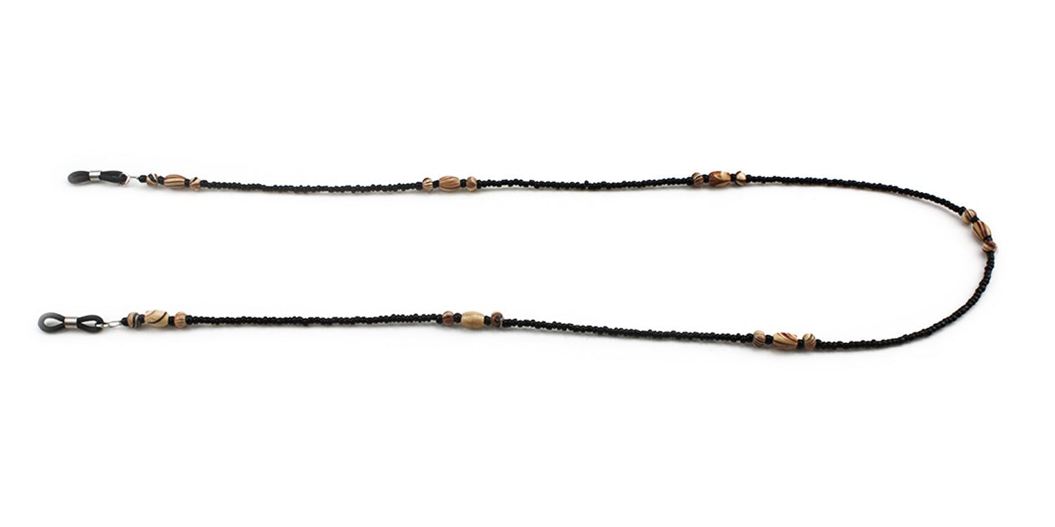Catenina per occhiali con perline nere e perline di legno. Anelli in gomma nera per il fissaggio alle aste.