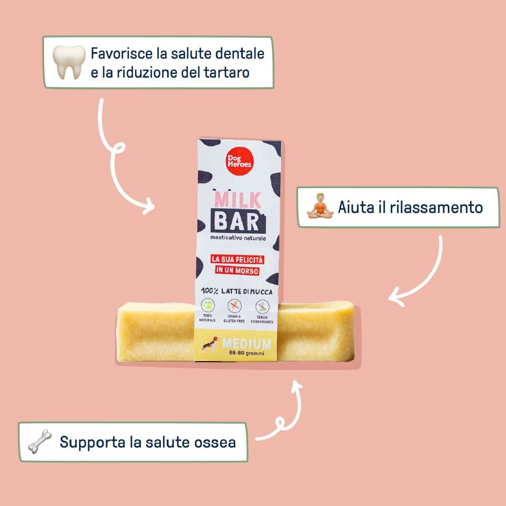 Milk Bar con confezione. La confezione mostra il nome del marchio e le informazioni sul prodotto. La barretta è marrone chiaro e rettangolare.