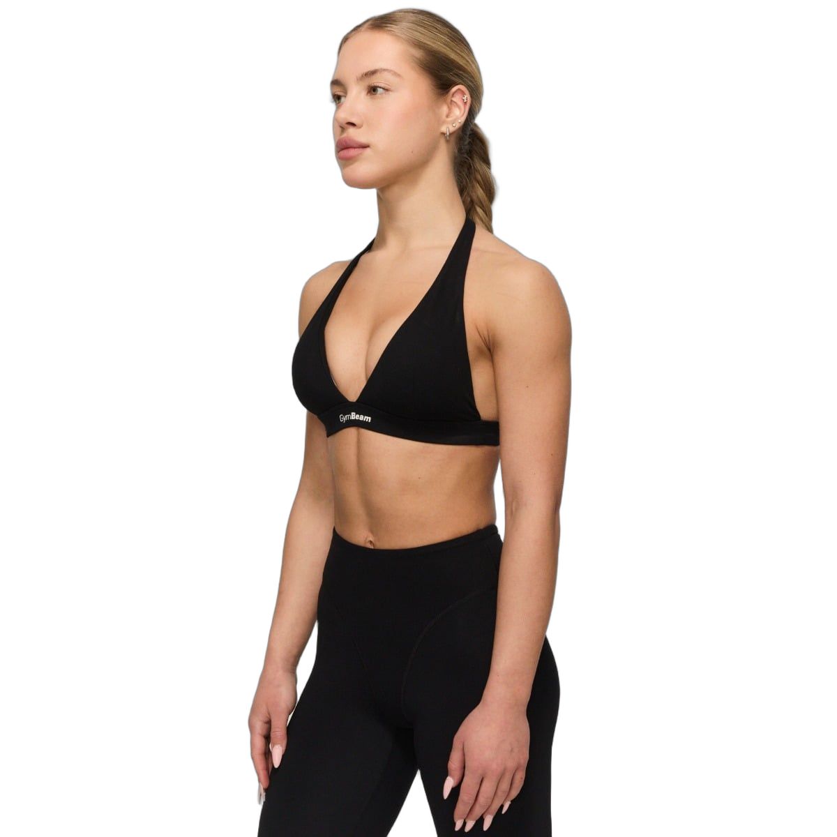 Vista laterale di un reggiseno sportivo nero con spalline all'americana e logo GymBeam.