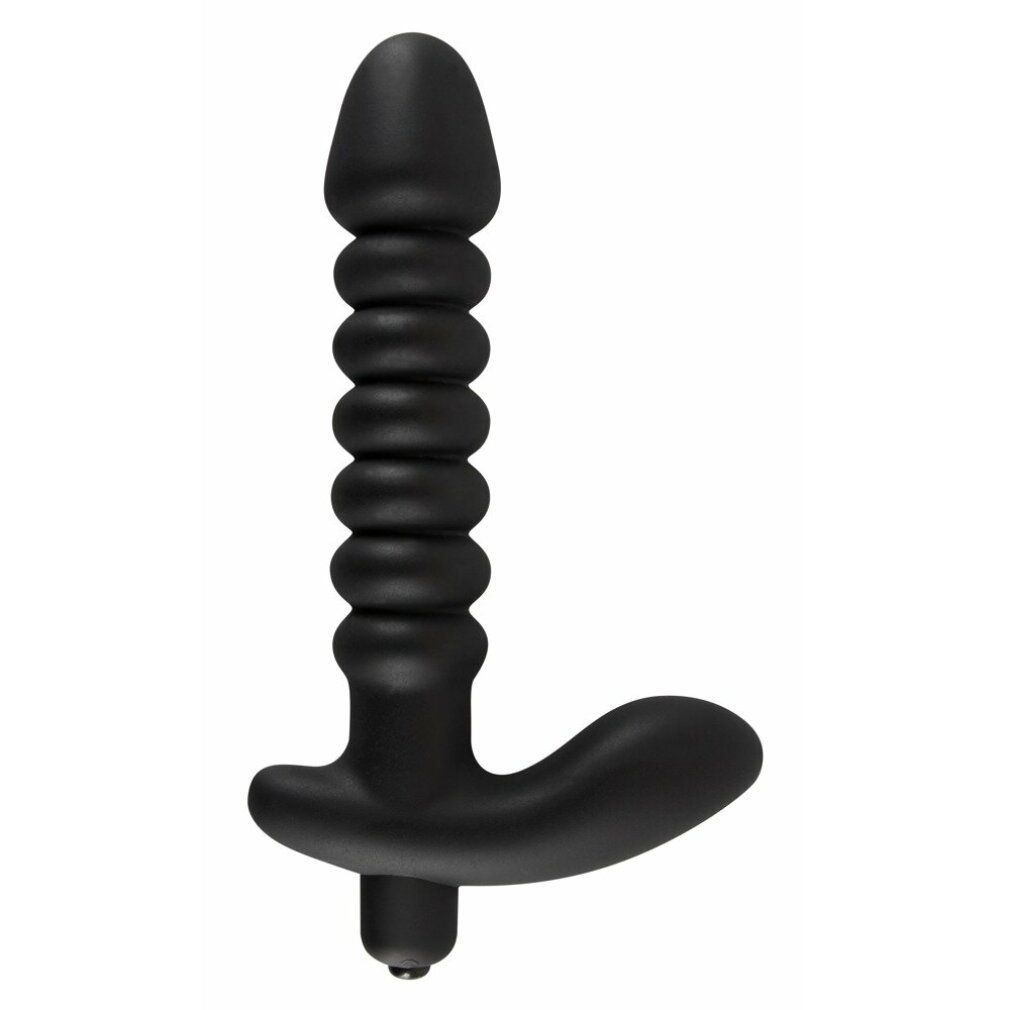 Plug vibrante nero. Superficie scanalata, forma a T. Materiale: silicone. Base con piccola sporgenza.