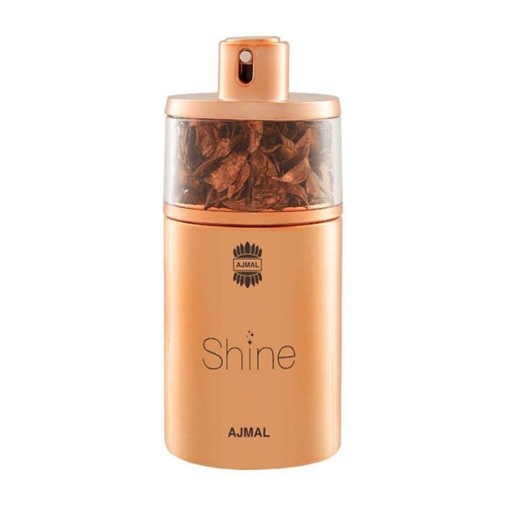 Flacone di profumo dorato con parte superiore in vetro. Scritta Shine e logo. La parte superiore contiene elementi marroni.