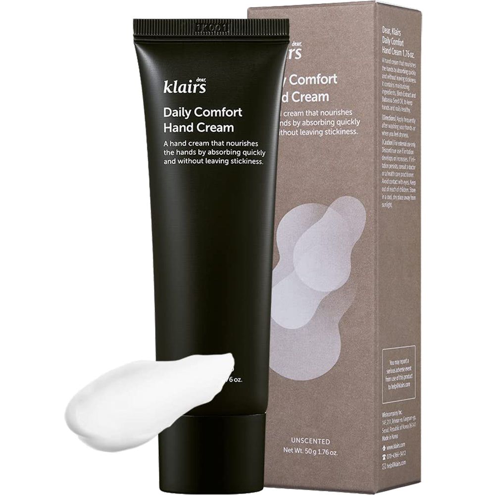 Tubo di crema per le mani e confezione. Tubo con crema bianca accanto. Scritta: Klairs Daily Comfort Hand Cream, senza profumo.