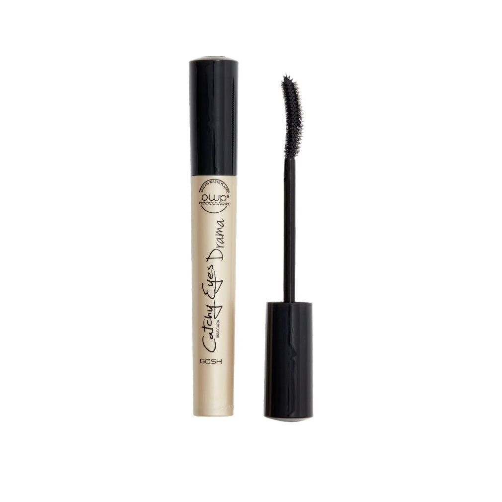 Tubo di mascara e spazzola. Scritta: Catchy Eyes Drama, GOSH. Tubo beige, cappuccio e spazzola neri.