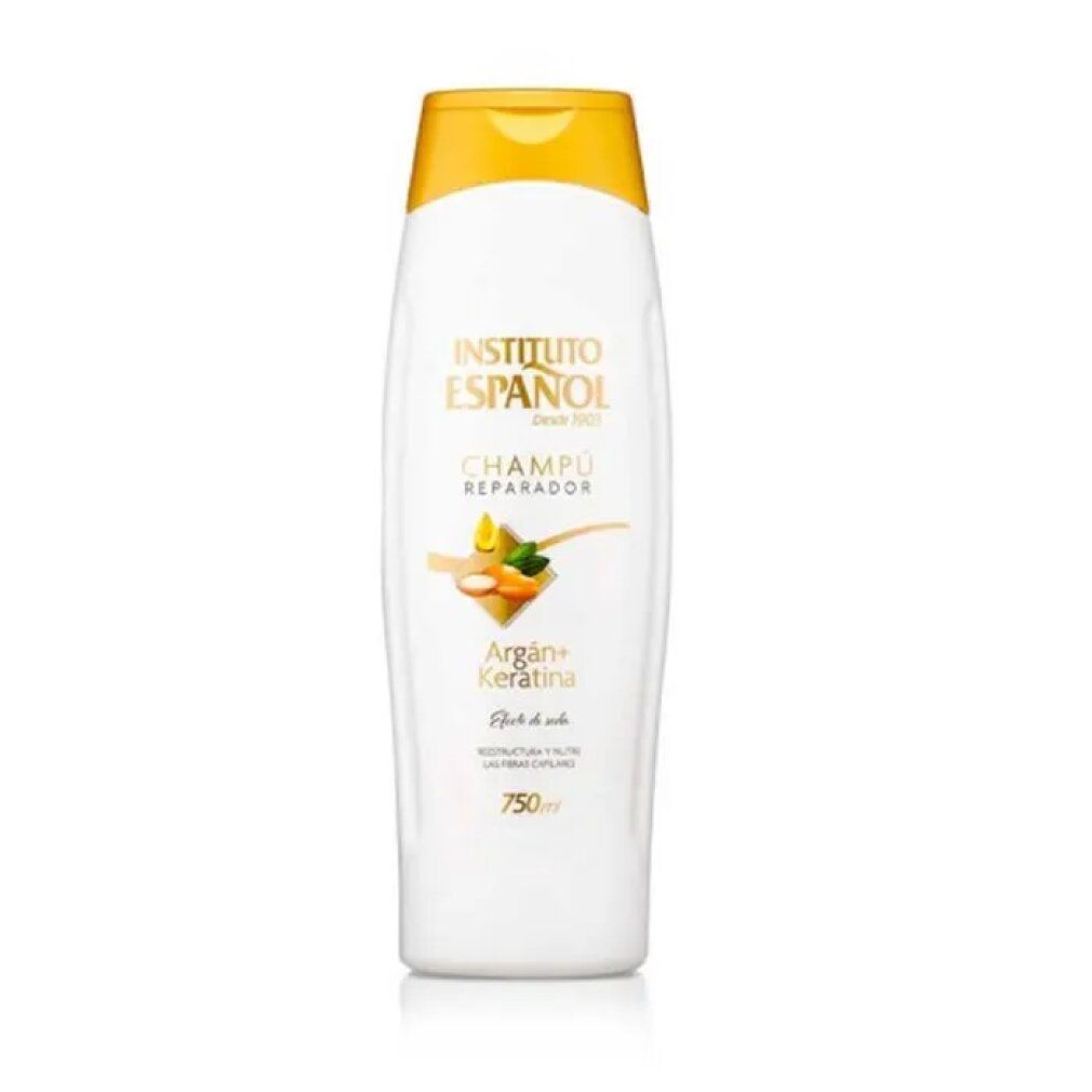 Flacone di shampoo bianco con tappo giallo. Scritta: Instituto Español, Champú Reparador, Argan + Keratina, 750ml.