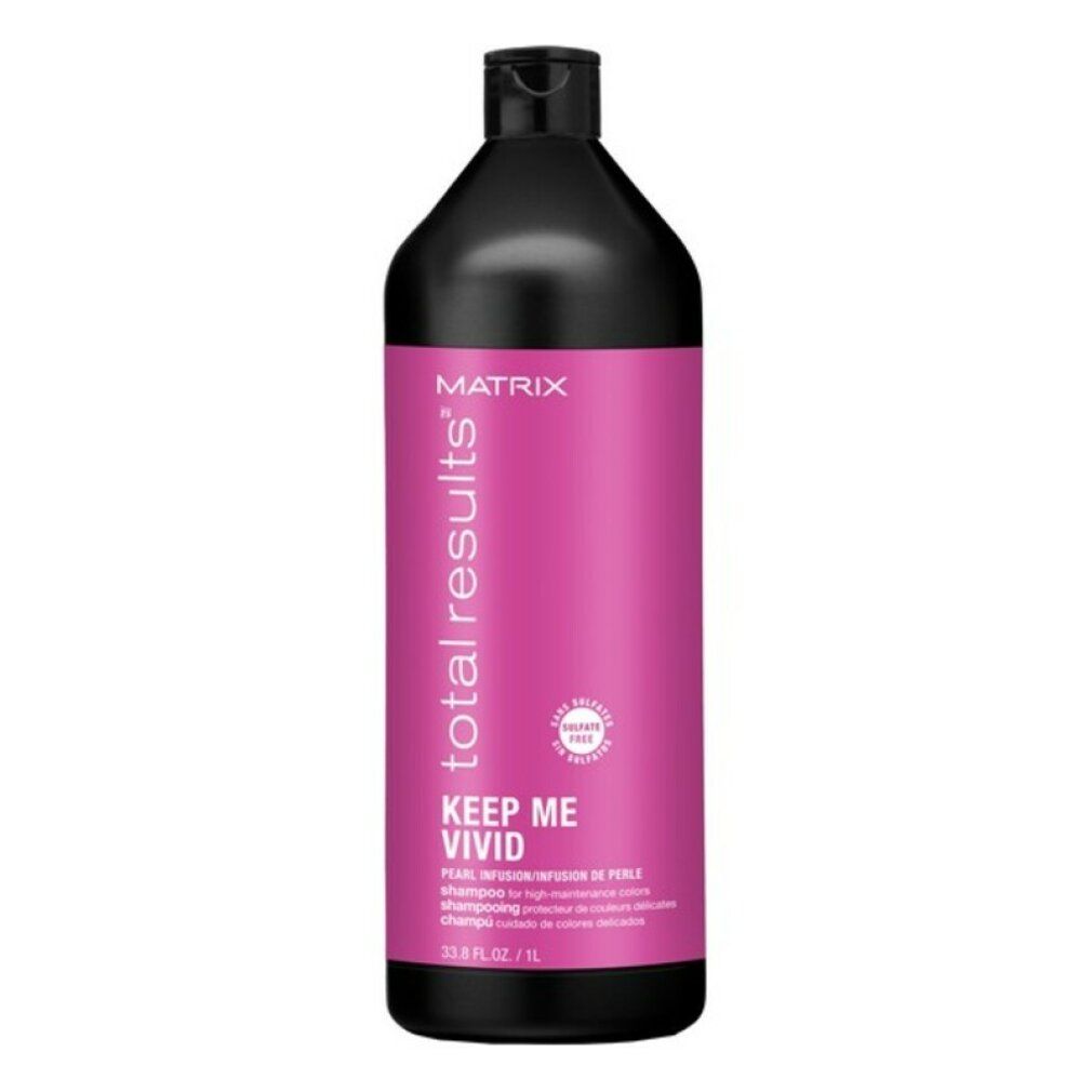 Flacone nero con etichetta rosa. Scritta: Matrix Total Results Keep Me Vivid Shampoo.