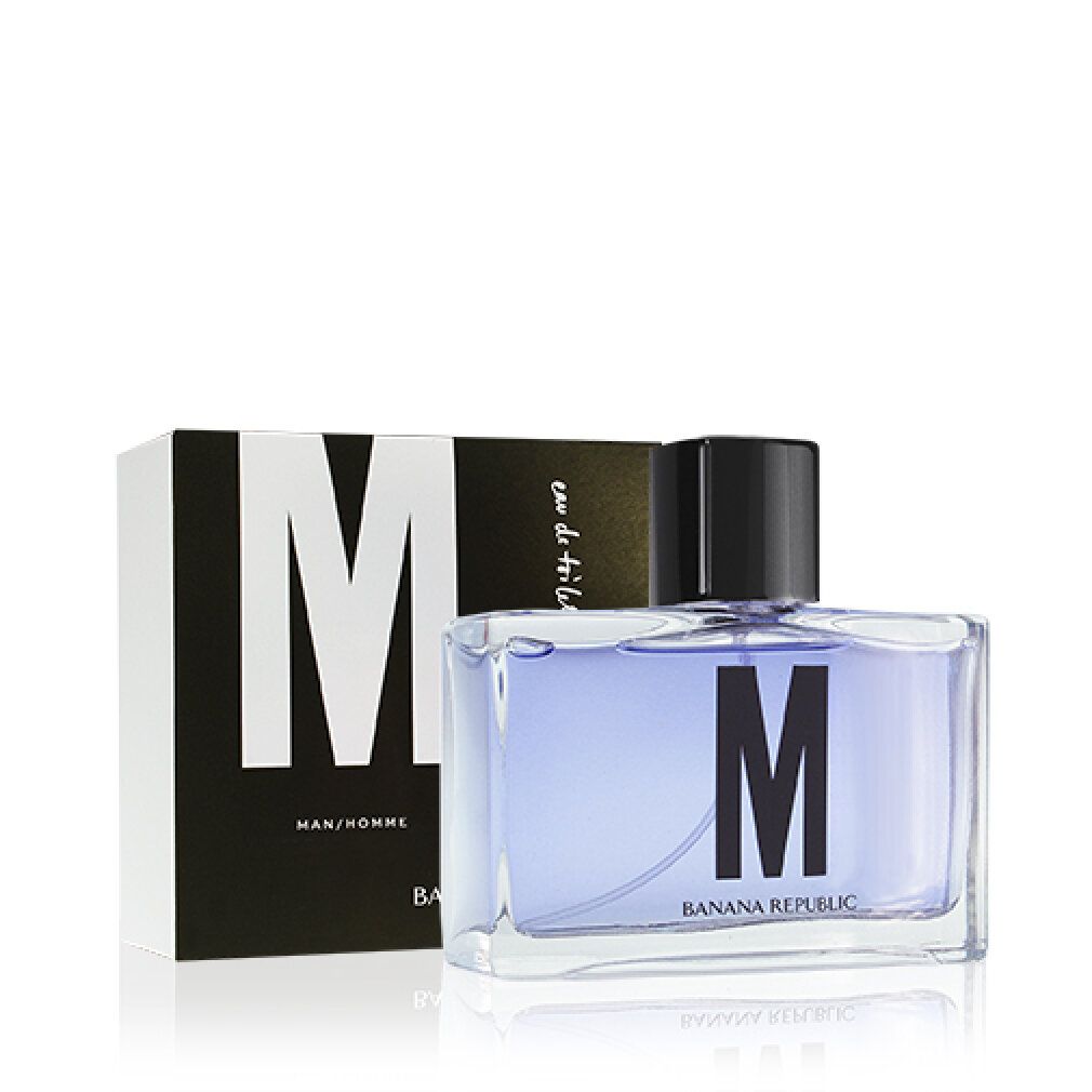Flacone e scatola Eau de Toilette. Scatola nera con "M" bianco. Flacone con tappo nero e "M".