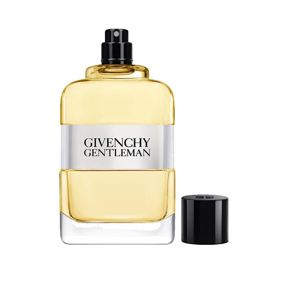 Givenchy Gentleman Eau de Toilette. Flacone rettangolare, tappo nero. Fascia bianca con logo. Tappo accanto.