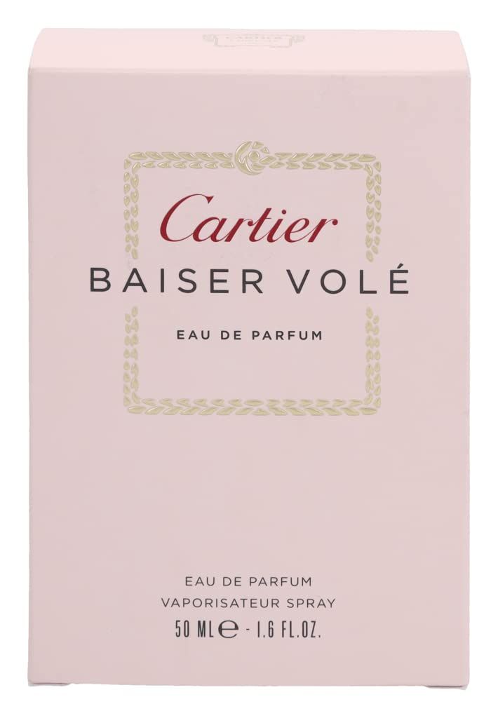 Scatola rosa con testo Cartier Baiser Volé Eau de Parfum Spray. Testo rosso e nero. 50 ml.