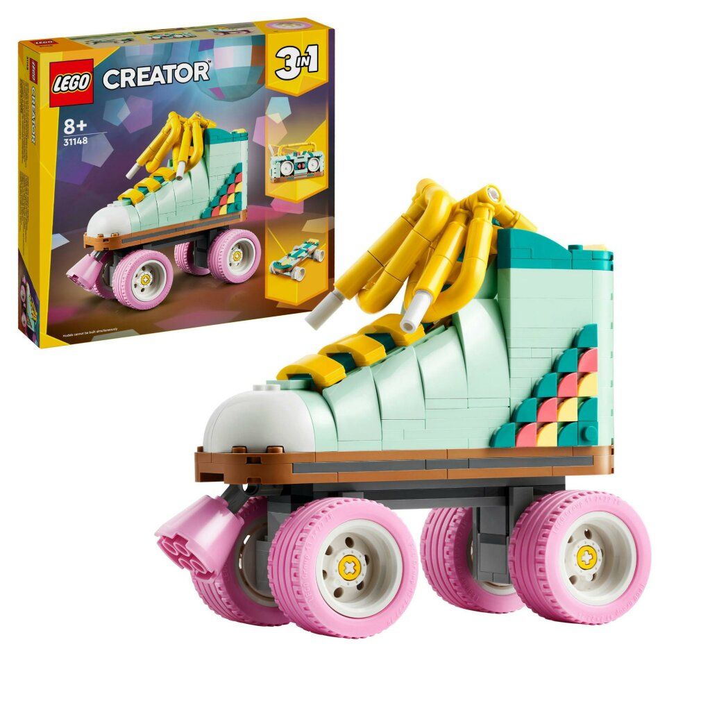 LEGO Creator 3in1. Pattino a rotelle retrò in mattoncini LEGO. Verde menta, ruote rosa, lacci gialli. Accanto alla confezione.