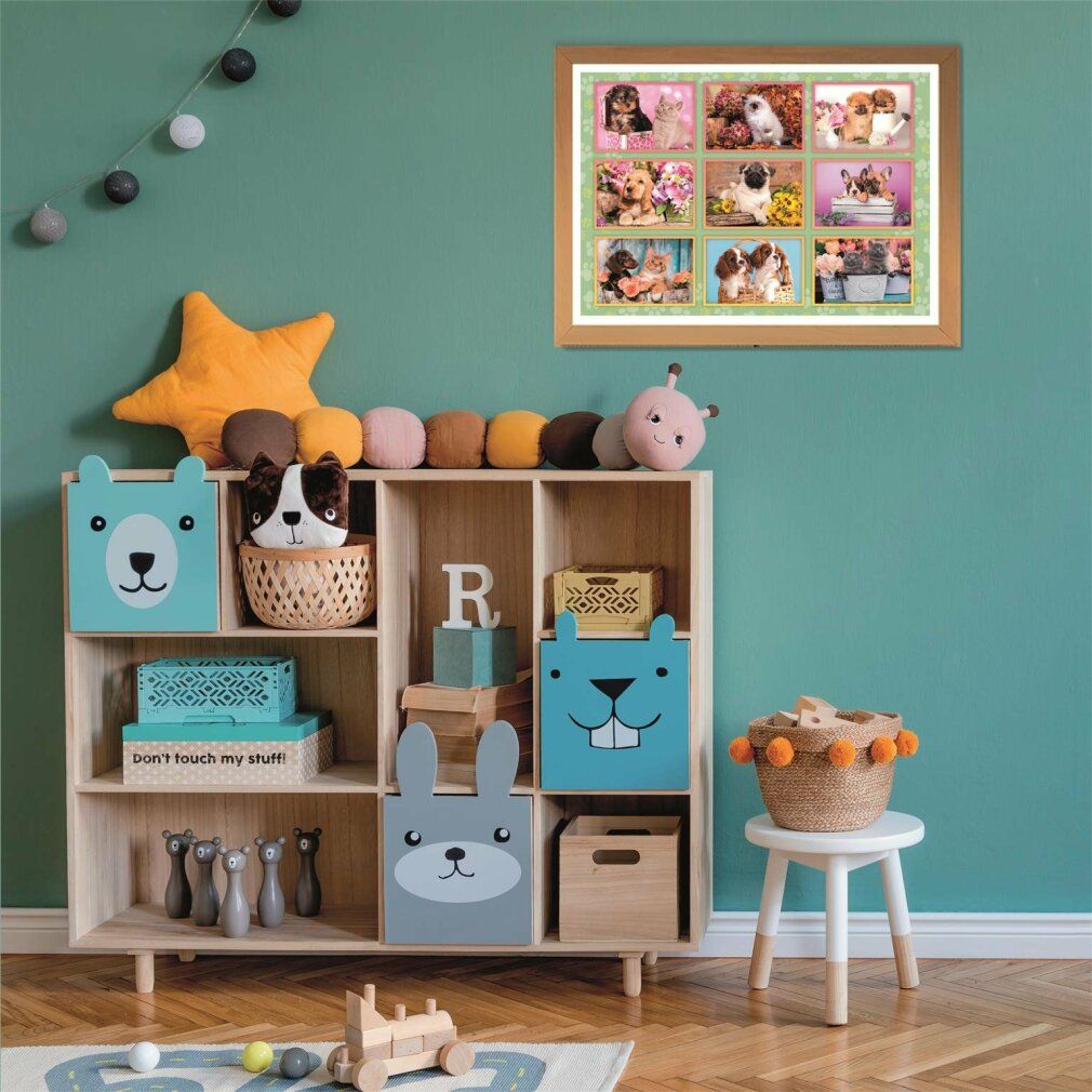 Puzzle incorniciato con cani e gatti su un muro. Decorazione.