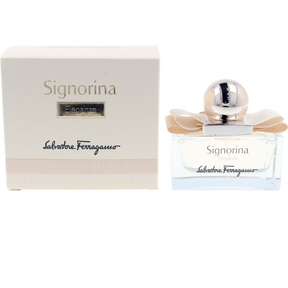 Flacone di profumo e confezione. Flacone con fiocco e tappo dorato. Scritta: Signorina Eleganza, Salvatore Ferragamo.