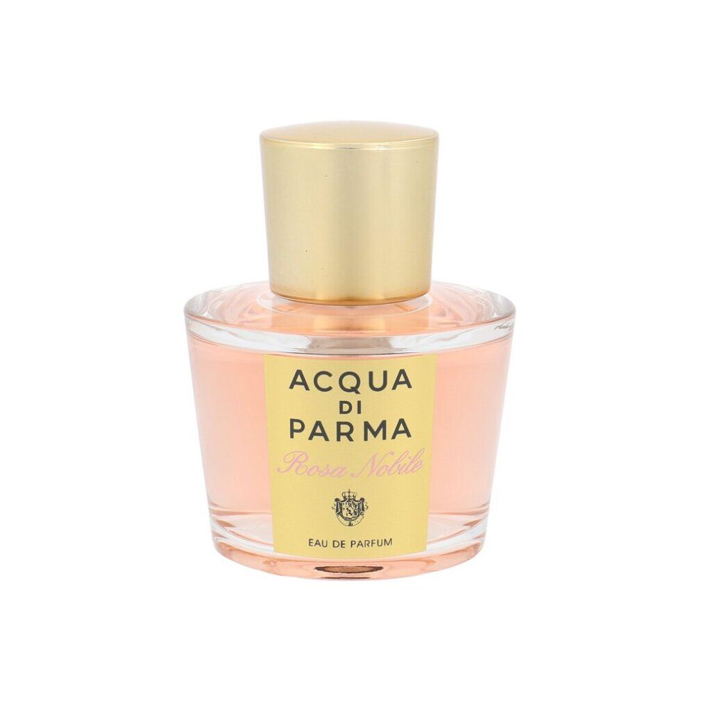 Flacone Acqua di Parma Rosa Nobile. Tappo dorato, liquido rosa. Etichetta gialla con logo e testo.