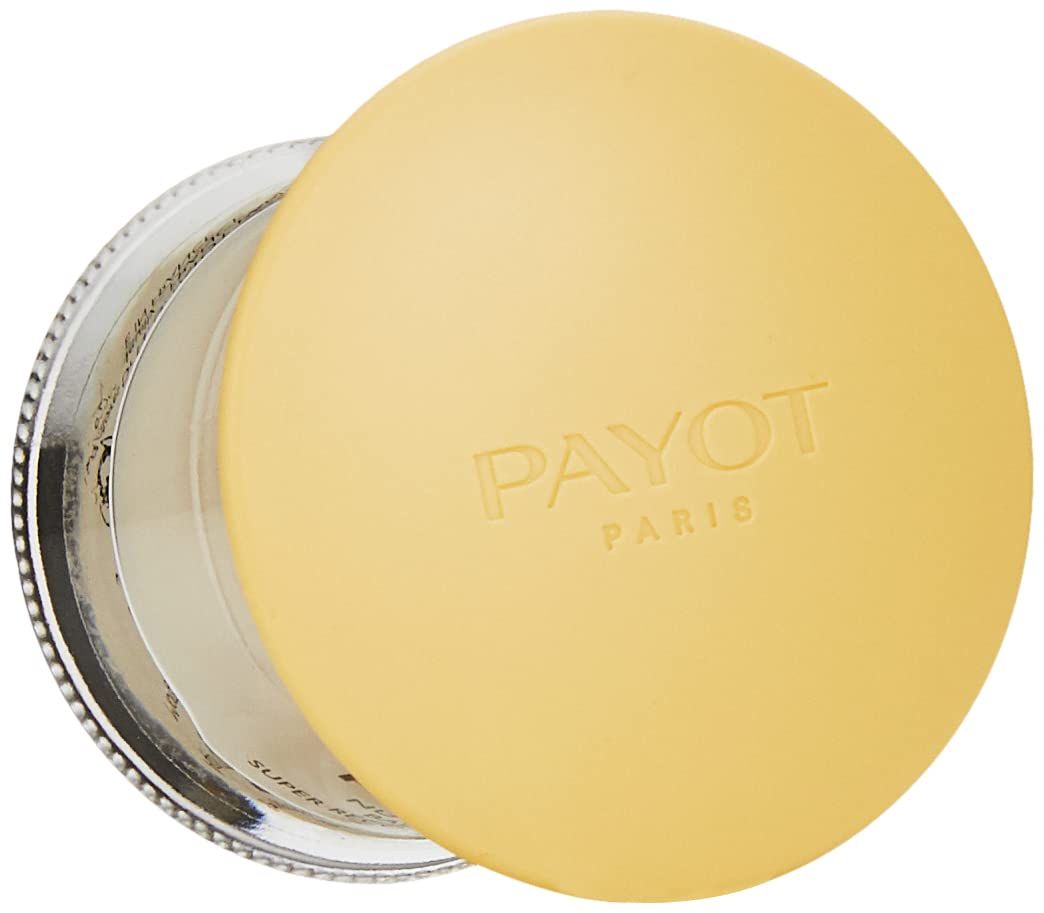 Vaso di crema aperto con coperchio giallo. PAYOT è scritto sul coperchio.