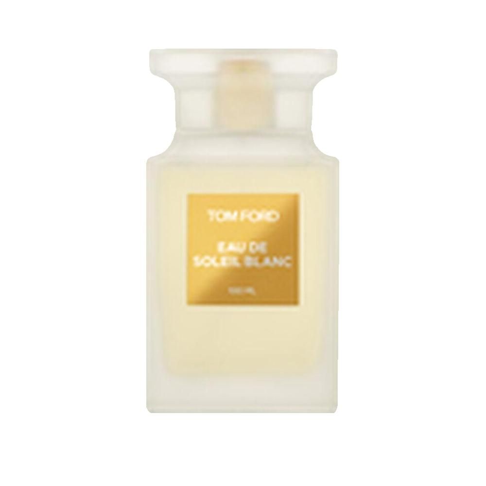 Flacone rettangolare con liquido bianco. Etichetta dorata con scritta TOM FORD EAU DE SOLEIL BLANC. Tappo trasparente.