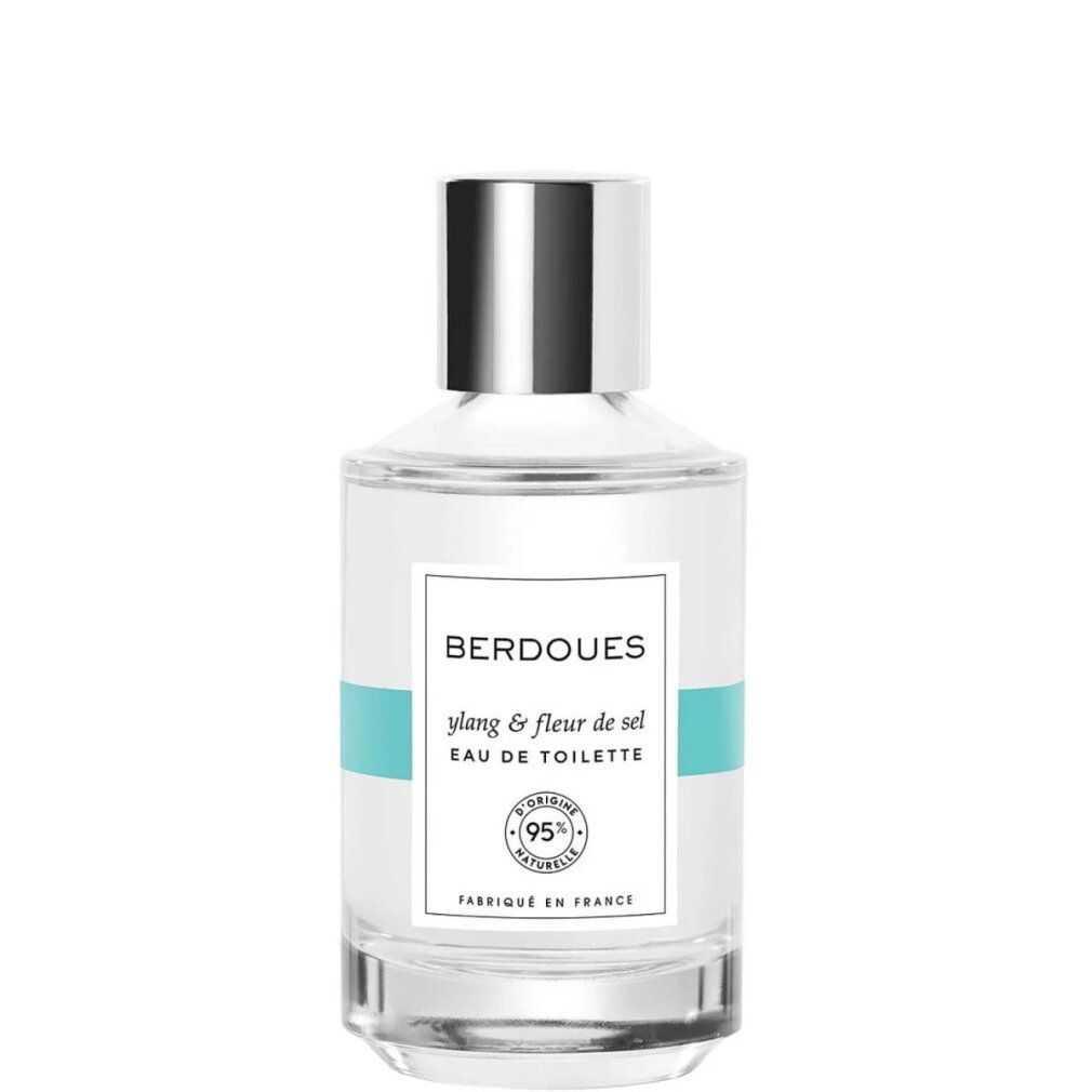 Flacone in vetro con tappo argentato, etichetta "BERDOUES ylang & fleur de sel EAU DE TOILETTE" e "95% d'origine naturale".