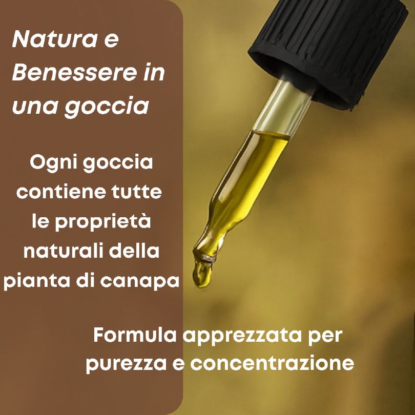 Contagocce con olio giallo e tappo nero, primo piano.