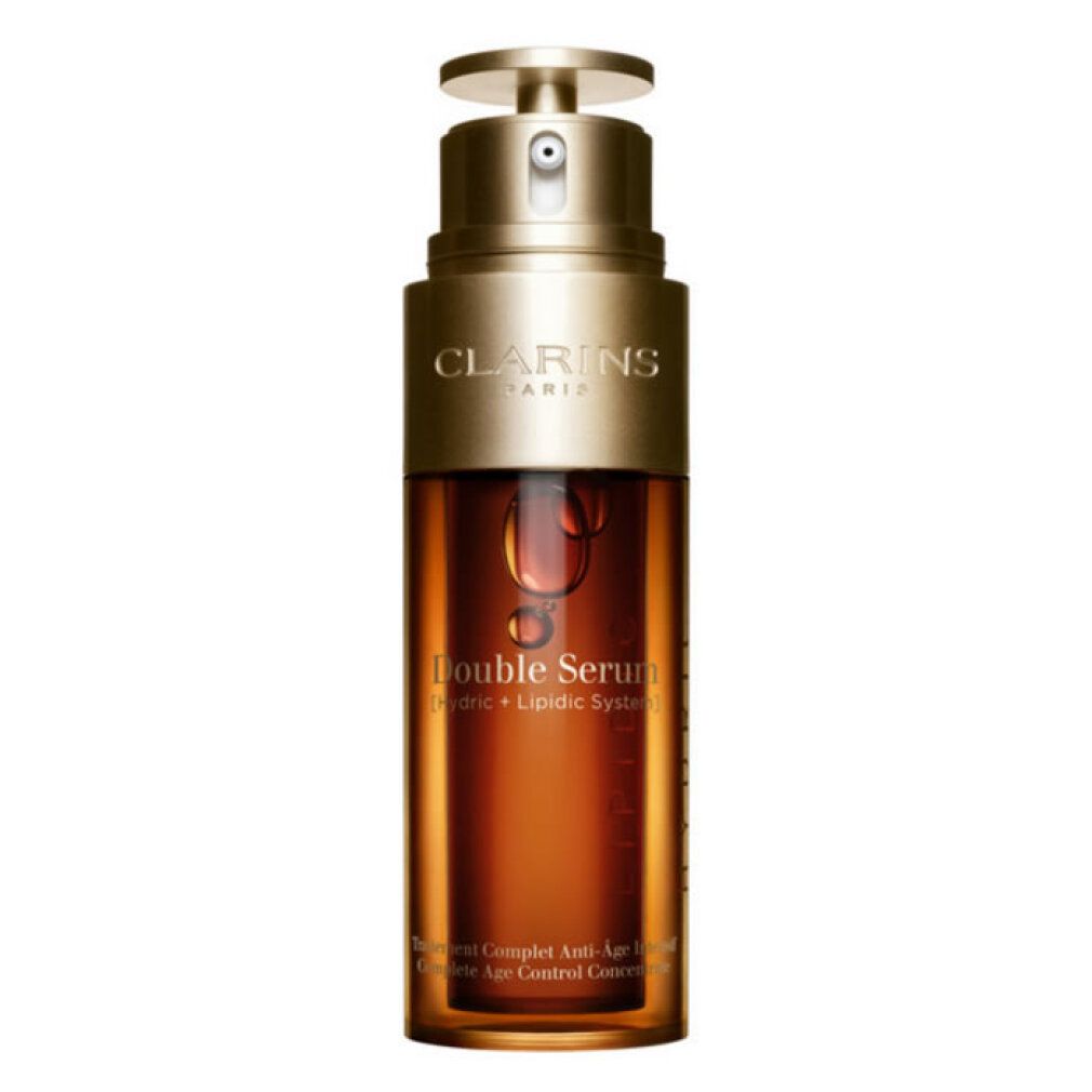 Flacone di siero con dosatore. Liquido marrone visibile. Testo: Clarins, Double Serum, Anti-Age.