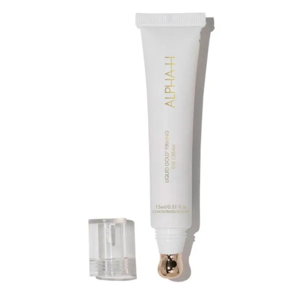 Tubo bianco con applicatore dorato. Scritta ALPHA-H e Liquid Gold Firming Eye Cream. Tappo accanto.