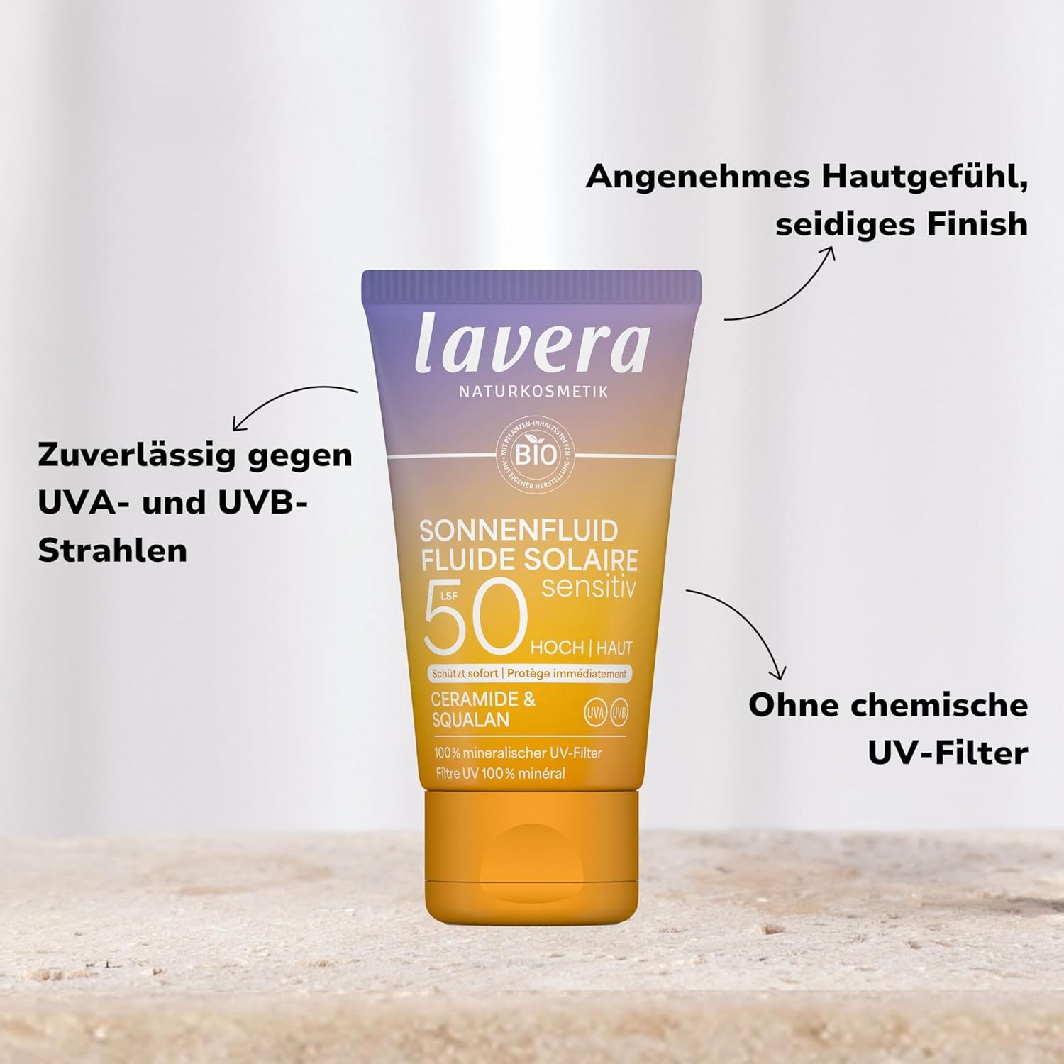 Tubo di lozione solare SPF 50. Marca: lavera. Testo: Fluido solare, sensitivo, senza filtri UV chimici. Certificazione bio.