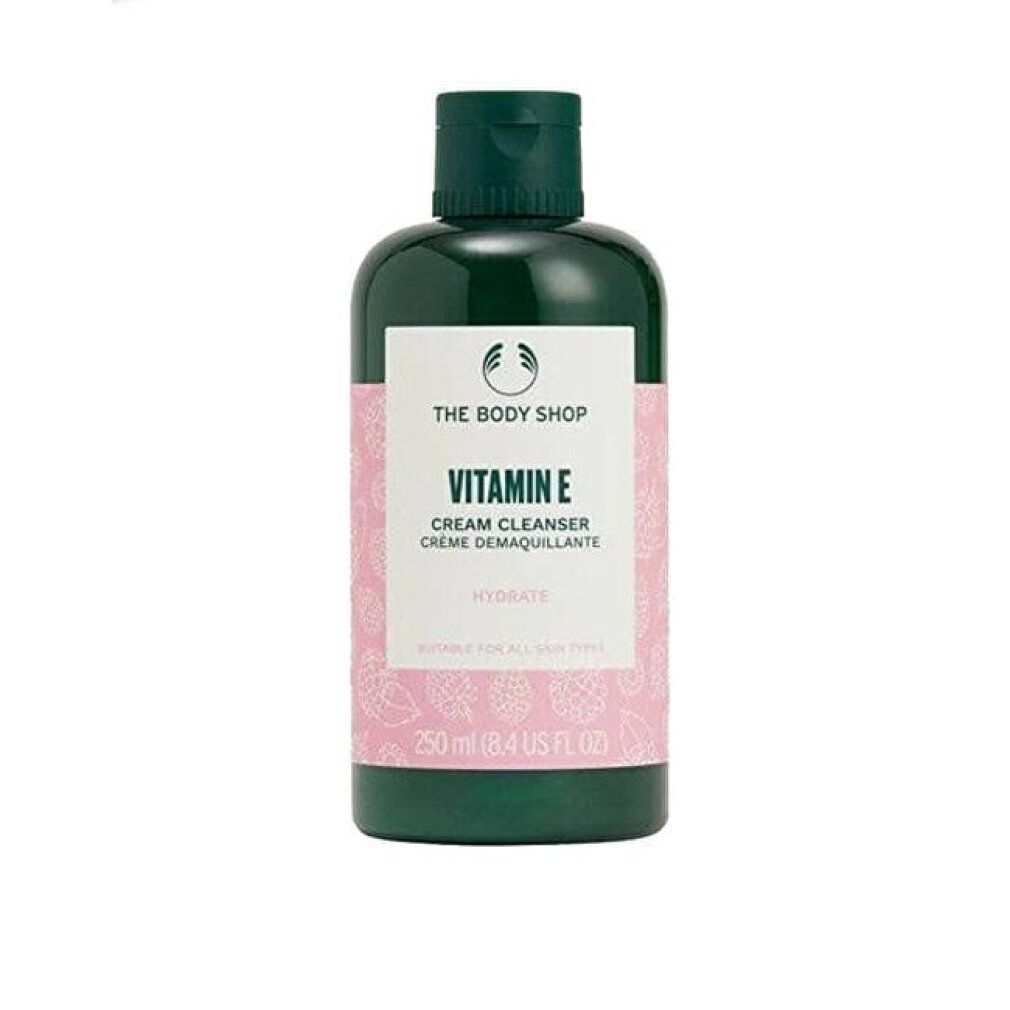 Flacone verde con etichetta bianca. Scritta: Vitamin E Cream Cleanser. Marchio: The Body Shop. Contenuto: 250 ml.