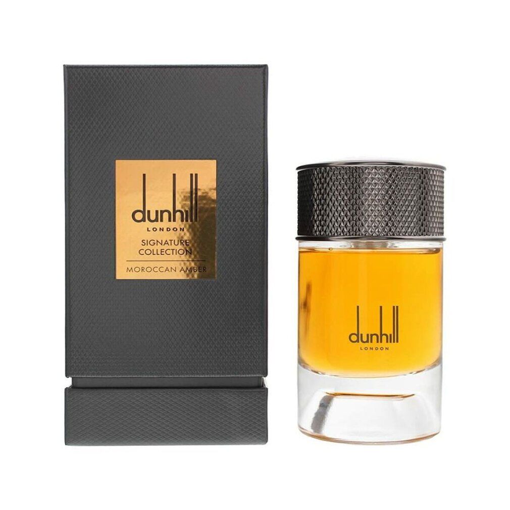 Flacone di profumo e scatola. Flacone con tappo argentato e liquido ambrato. Sulla scatola è scritto Dunhill Signature Collection Moroccan Amber.