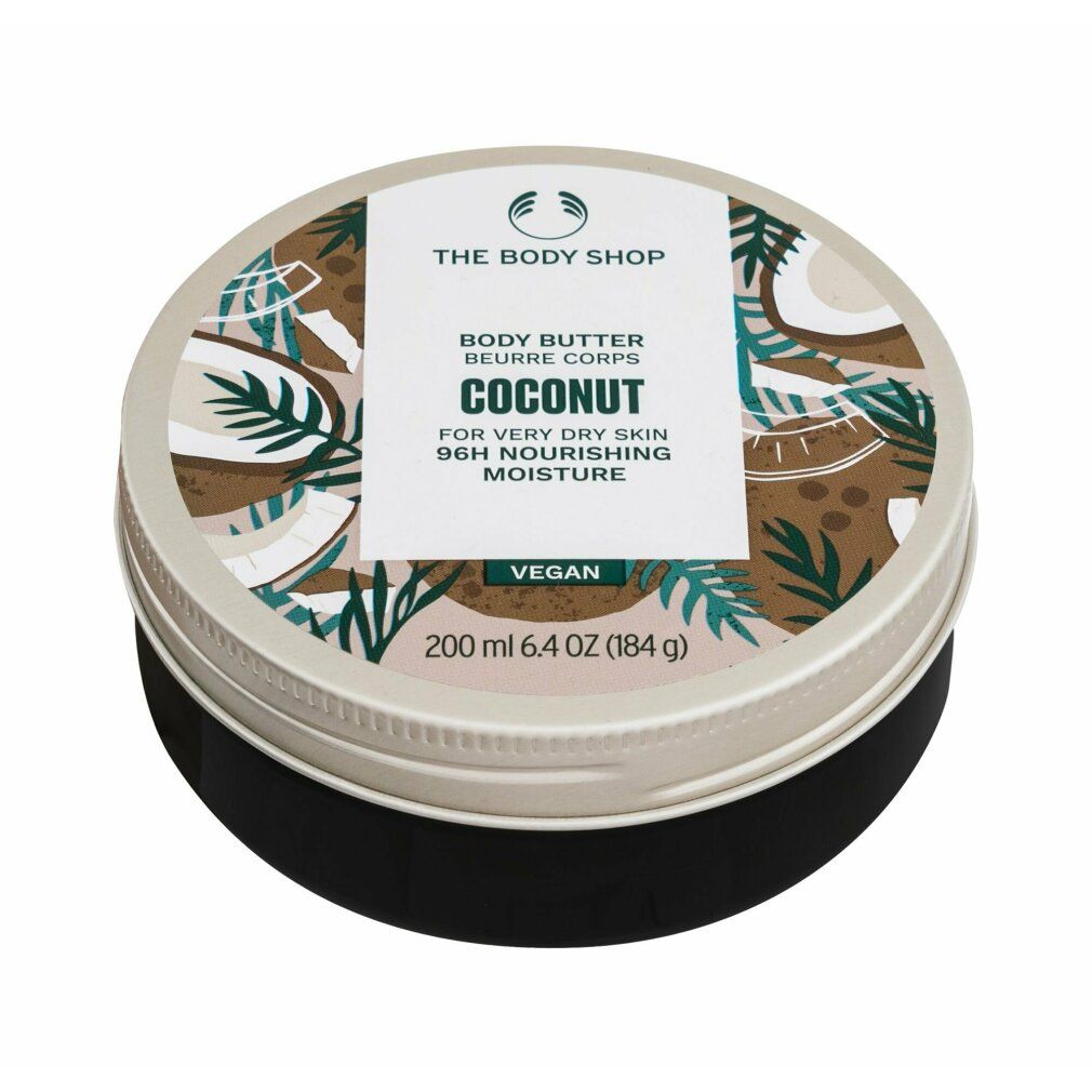 Barattolo rotondo di burro corpo, design cocco. Scritta: The Body Shop, Body Butter, Coconut, per pelli molto secche, vegano. Contenuto: 200 ml. Base nera.